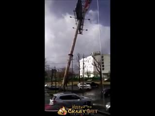 CrazyShit.com | Billboard Sign Crushes Car - Crazy Shit