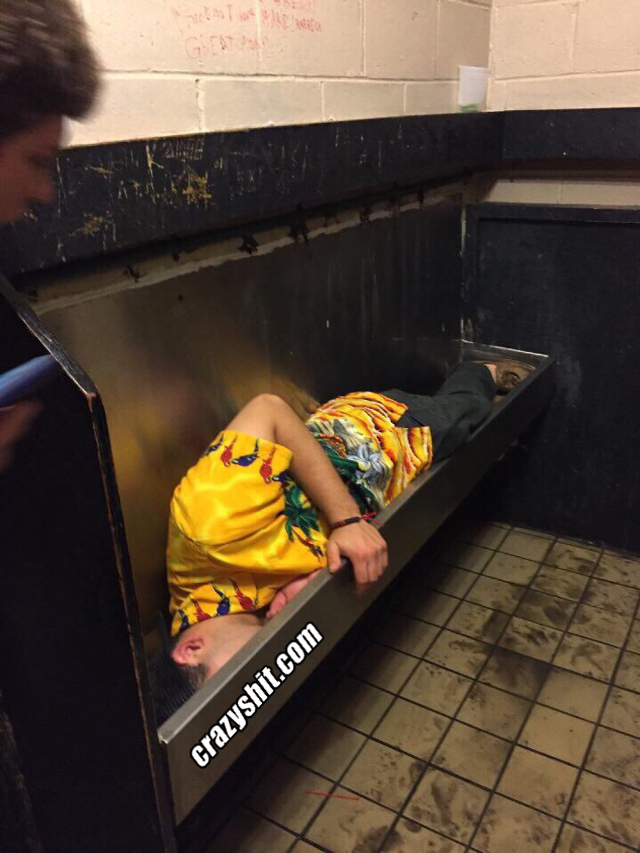 Drunk Guy Sleeping In A Urinal
