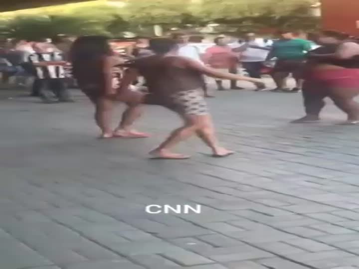 CrazyShit.com | Girl is stripped topless during the street brawl - Crazy Shit