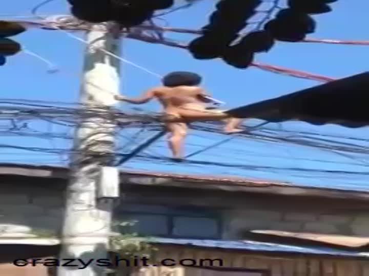 CrazyShit.com | Nude woman grabs high voltage wire - Crazy Shit 