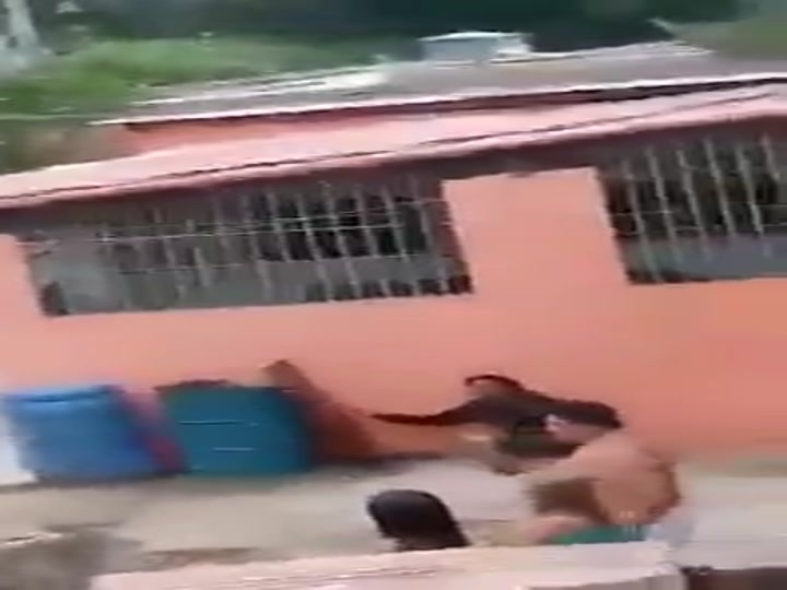 woman attacked with sticks - Crazy Shit