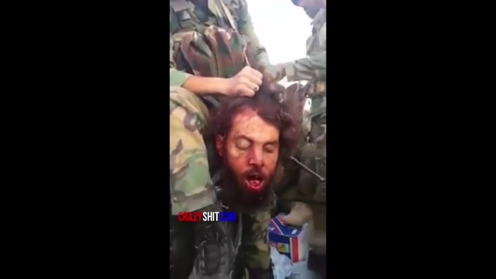 CrazyShit.com | Terrorist beheaded by soldiers