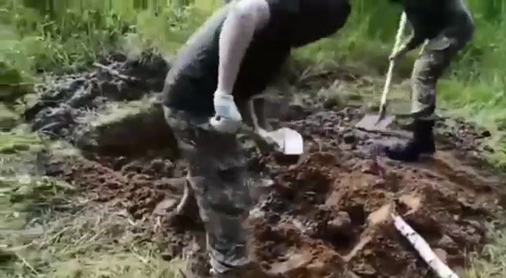 CrazyShit.com | Separatist Russian buried alive by Ukrainians. Somewhere in Eastern Ukraine in the last years - Crazy Shit