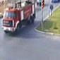 Motorcycle slams into firetruck at intersection