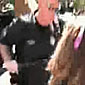 Cop at the DNC gives code pink lady some stick time