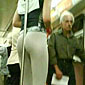 Pole dancing on the subway