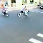 Two motorcycles collide at an intersection