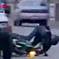 Motorcyclist slams into the back of a car