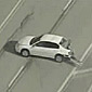 Car gets split in half during high speed chase