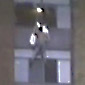 Man climbs down a building the easy way