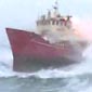 Huge fishing boat gets tossed by bigger waves