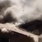 Firefighter Falls Through Roof