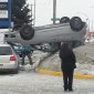 Woman Lands Her Car Upside Down