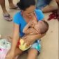 Mom Breast Feeds Baby After Crashing Moped