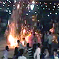 INDIA: BURNING STATUE LANDS ON CROWD