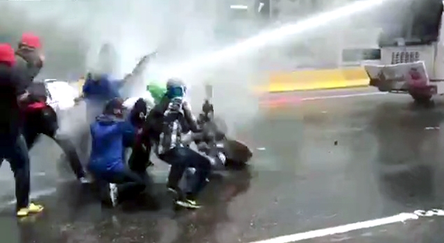 ROFL: PROTESTERS GE RAGDOLLED BY BEHEMOTH WATER CANNON