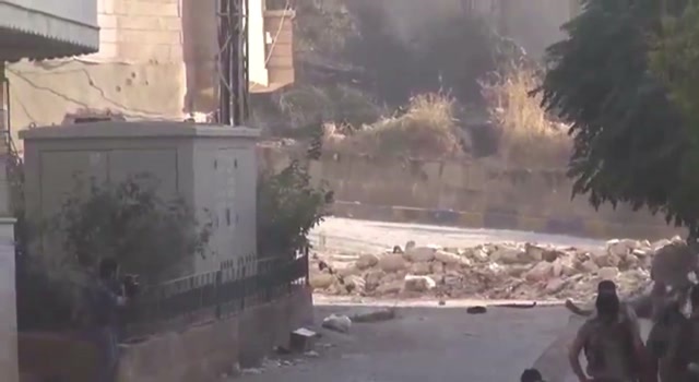 GRENADES LAND BETWEEN REBELS
