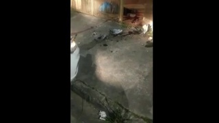 uber thief crushed against a house gate