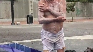 New Immigrant Bathes In Public Fountain.