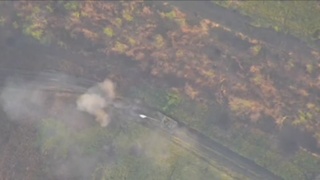 naked high ukraine soldier on tank pounded by kamikaze drone