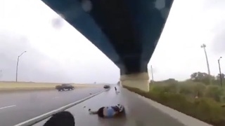 Lesbian biker hit by tire