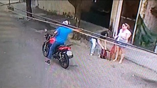 Armed Robber shoots woman