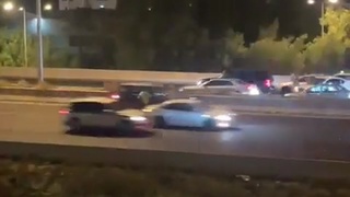 Guy running down highway