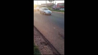 Woman collected in pieces under the truck