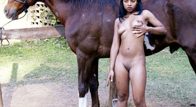 Posing naked beside a horse