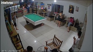 man opens fire in a crowded billiards bar in Brazil