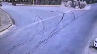 Tanker Truck falls onto motorcyclist