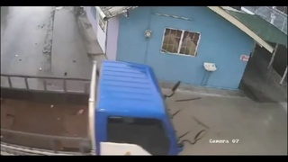 Thrown clear then run over by own truck