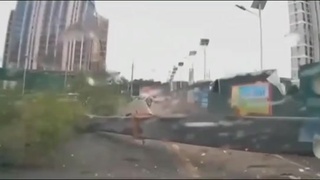 Falling Crane Hits Scooterist