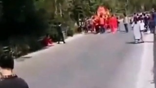 Chinese parade interrupted by truck