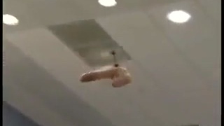 Flying dildo attends press conference