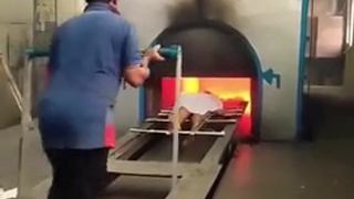 Dead Body Lifts Arm During Cremation