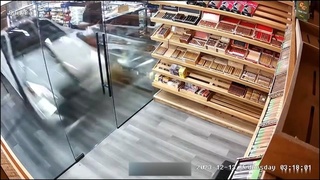 Car Crashes Into Shop-Exits Thru Rear