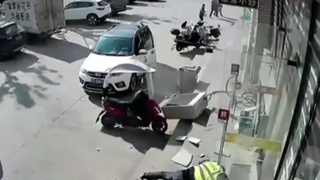 Runaway Tire Hits Security Guard