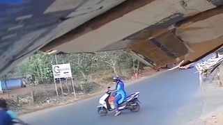 Indian woman scooty and men bike crashed