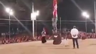 DANCER CARRYING MASSIVE FLAG GETS FATALLY ZAPPED WHEN FLAG TOUCHES POWER LINE