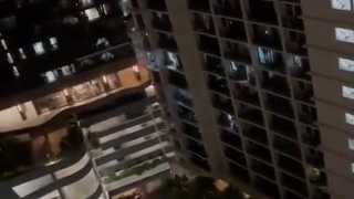 MAN THROWS GIRLFRIEND FROM APARTMENT BALCONY