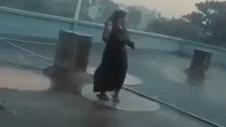 CHICK DANCING IN RAIN STRUCK BY LIGHTENING