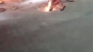 A WOMAN'S KILLER WAS BURNED ALIVE IN RIO'S FAVELA