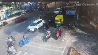 DISTRACTED LADY MEETS THE BUS IN INDIA