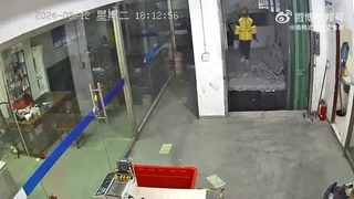CHINESE WORKER ENDS HIS SHIFT EARLIER THAN EXPECTED