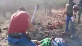 Cartel Guys Cut Up A Tied Up Guy With An Ax