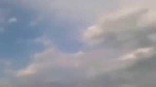 Guy throws a copper wrapped rock on the power line