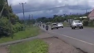 Motorbike Crashes into Subaru