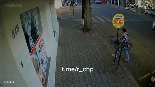 A motorcyclist is quickly stopped by a road sign