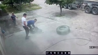 Mechanic Takes An Exploding Tyre To The Face